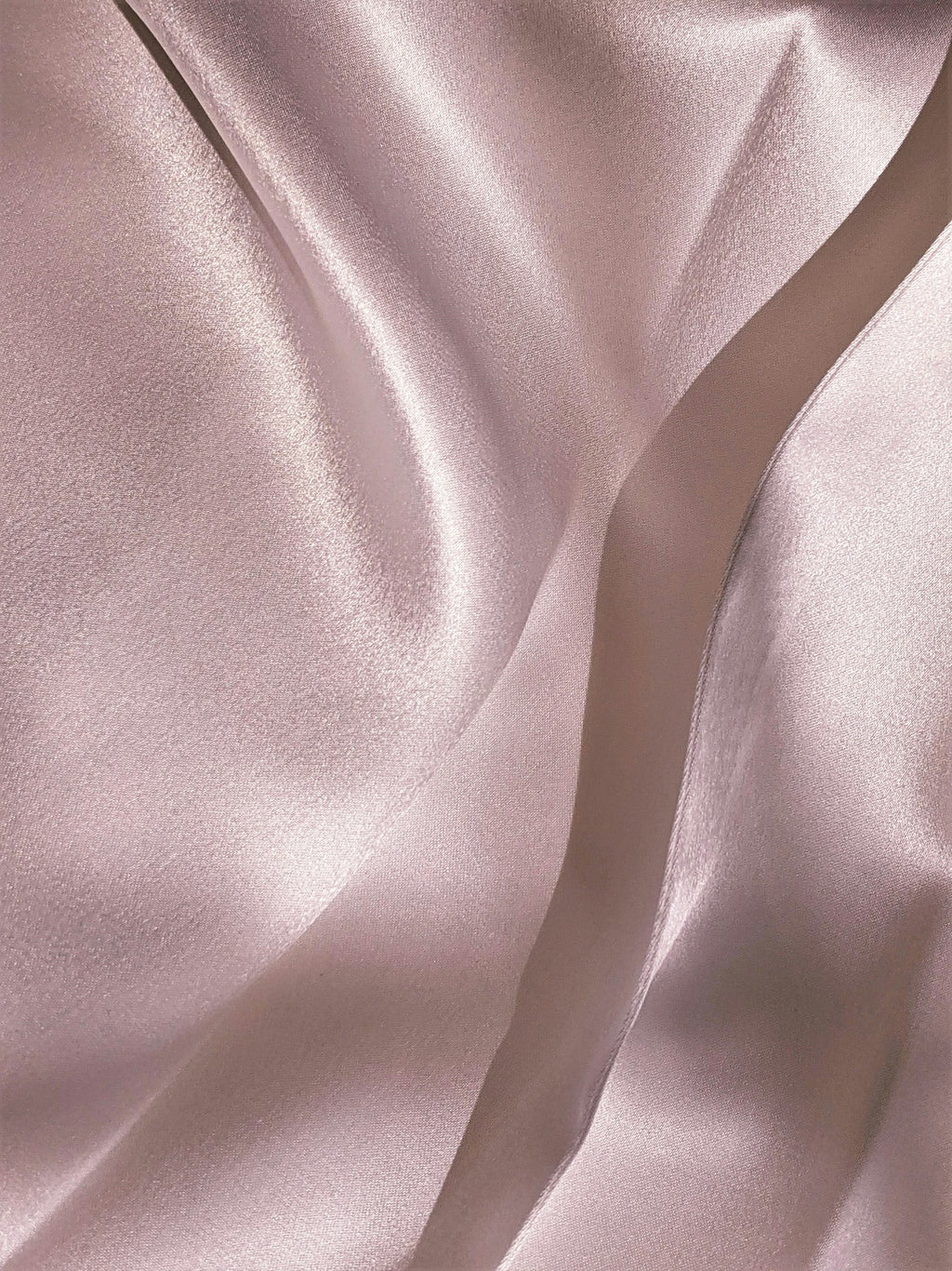 Luxury silk fabric in soft blush tone