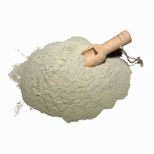 Activated charcoal mask mixed in a bowl with an application brush, showing the mask's multipurpose deep-cleaning use